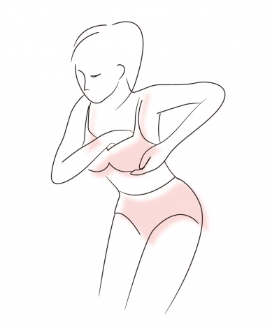 正しいブラジャーの着用法【3】／再び上体を曲げ、脇・アンダーバストの脂肪をしっかり入れ込んでから上体を起こし、整えます 