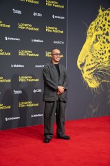 �X�C�X�u��78�񃍃J���m���ۉf��Ձv�ōō��܁E���^�܂���܂����f��w���Ɠ��X�x�O��ēi���b�h�J�[�y�b�g�j�@Copyright: Locarno Film Festival / Ti-Press 