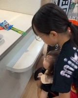 ���W�ɓ͂��悤�ɕ��������Ă����钷�� 